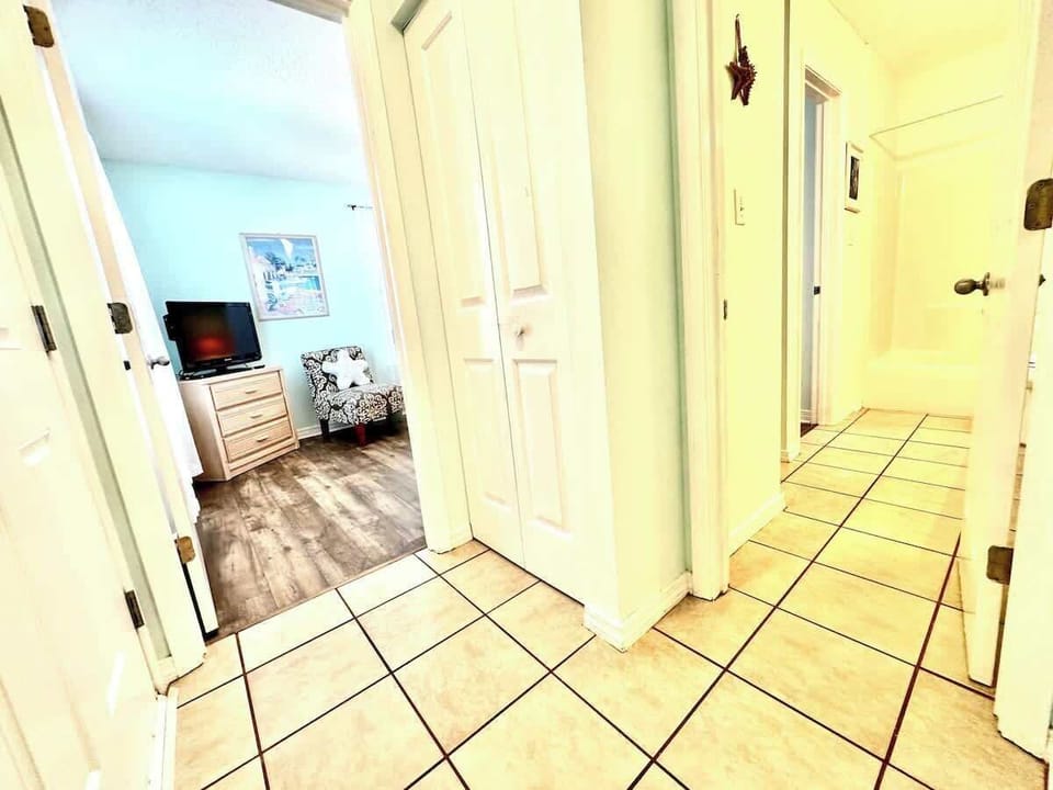 Guests can access the bathroom with a hallway door, or directly from the bedroom.