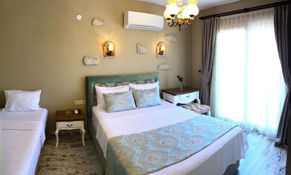 Panoramic Triple Room, Multiple Beds, Balcony, Pool View | Premium bedding, Select Comfort beds, minibar, laptop workspace