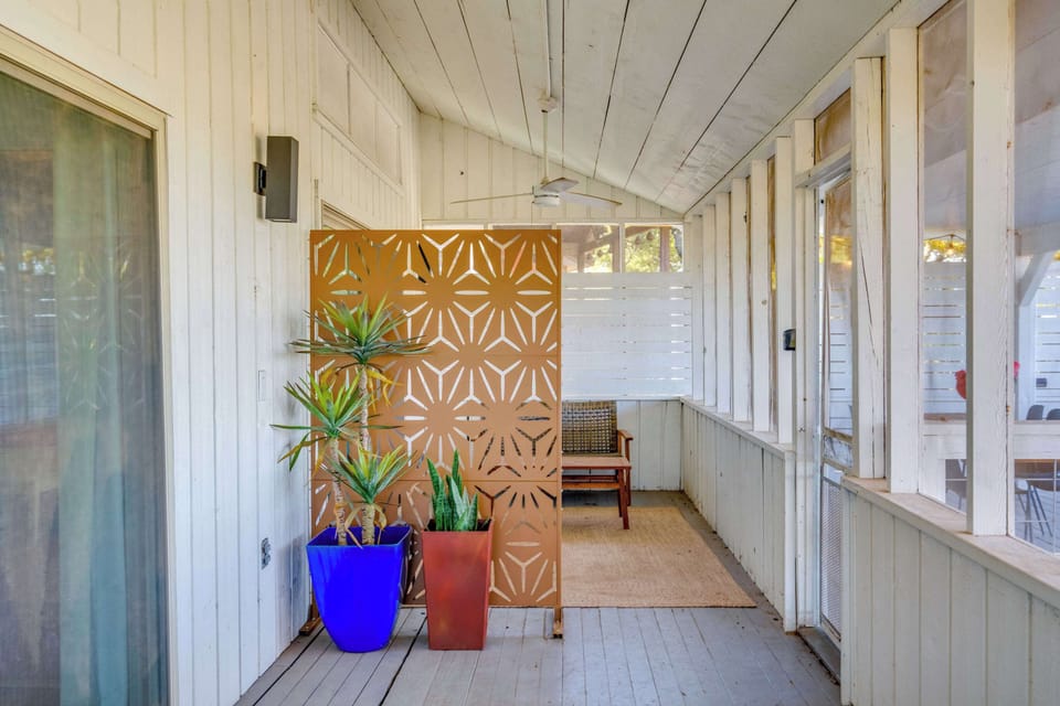semi private deck space off the master suite with 180 degree lake views & screened in porch with fans