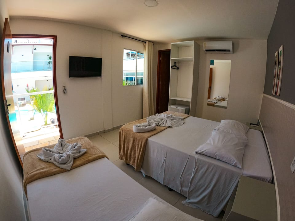 Standard Triple Room | Minibar, free WiFi, bed sheets