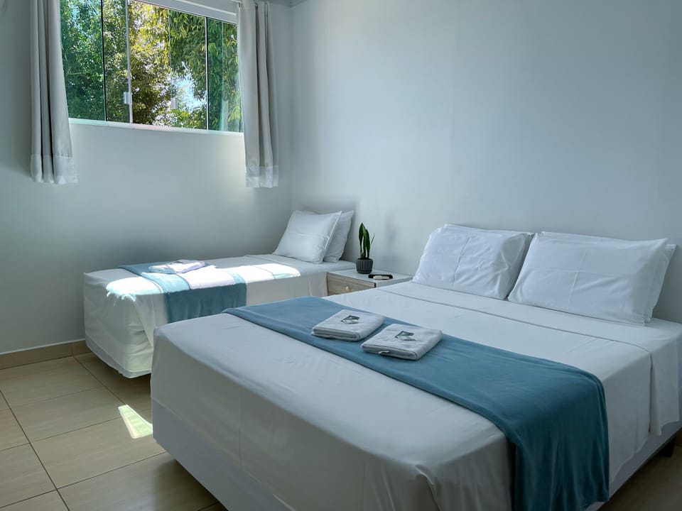 Standard Triple Room | Minibar, iron/ironing board, free WiFi, bed sheets