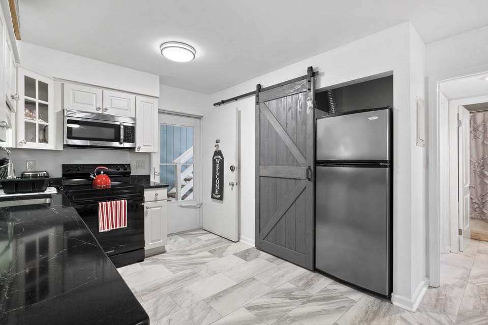 You'll have easy access to the in-unit Washer & Drier, just slide the barn door!