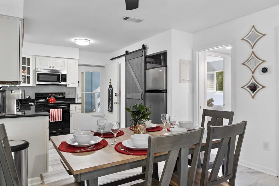 Enjoy a meal or play a game at this brand new dining table with seating for 6.
