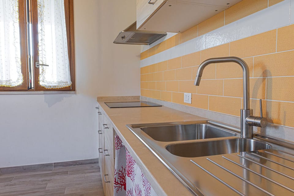 Full-size fridge, microwave, stovetop, toaster