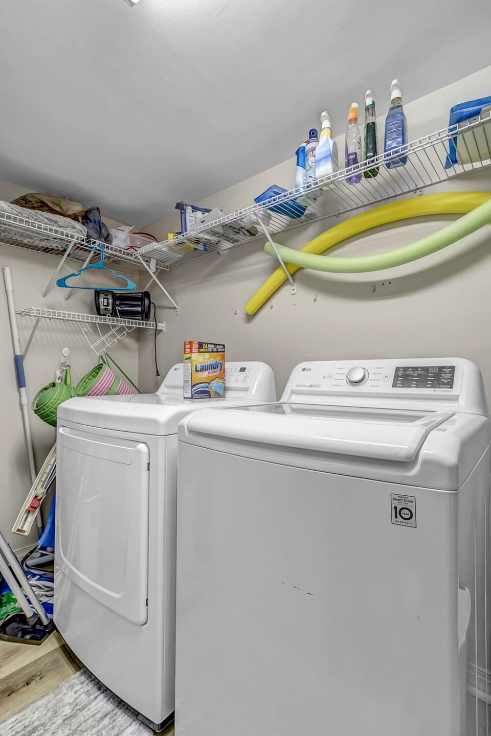 - Make laundry day a breeze with an LG washer dryer duo and plenty of open shelving above
- Essentials like detergent, hangers, and beach gear are ready for your stay
- Tidy utility space tucked away to keep your vacation hassle free
