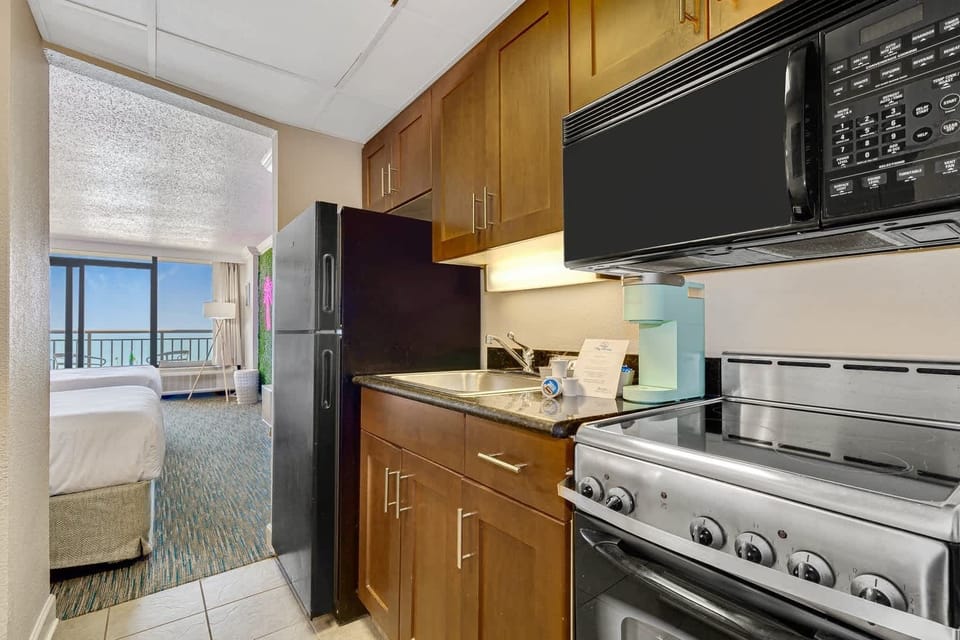 Fully equipped kitchen with all the essentials for a comfortable stay.
