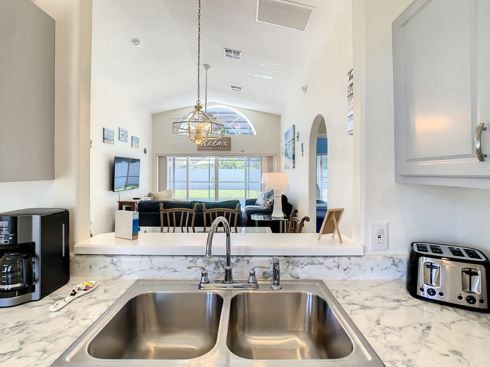 Open-concept design with a seamless flow from kitchen to dining.