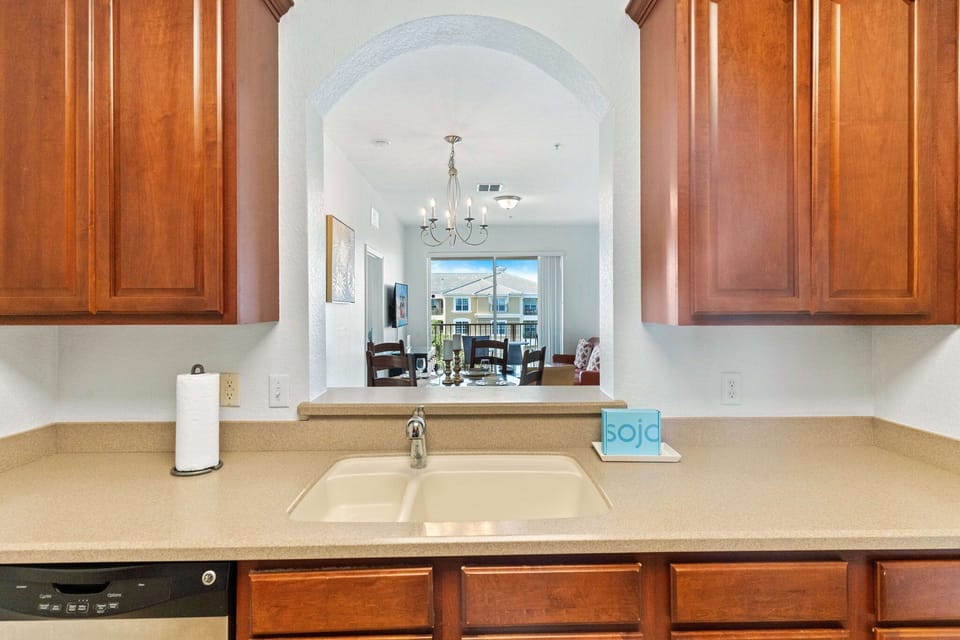 Culinary haven: This stylish kitchen captures the essence of modern design, blending functionality and aesthetics seamlessly for a perfect cooking and gathering space.