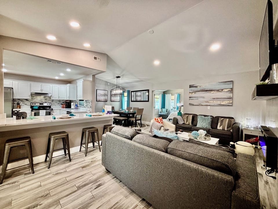 Open concept living room/kitchen/dining room
