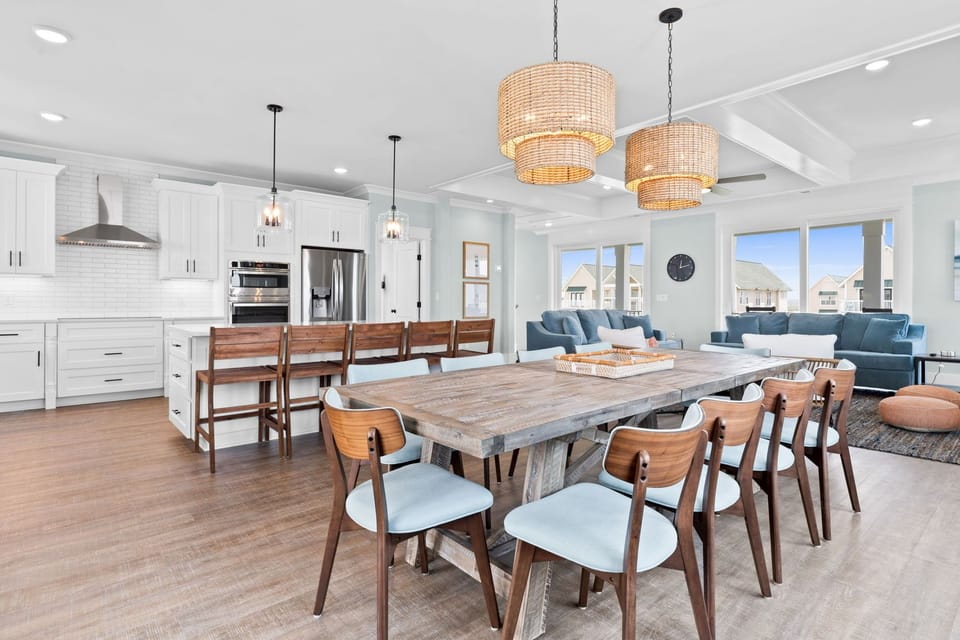 Spacious table and kitchen island for everyone to gather around 