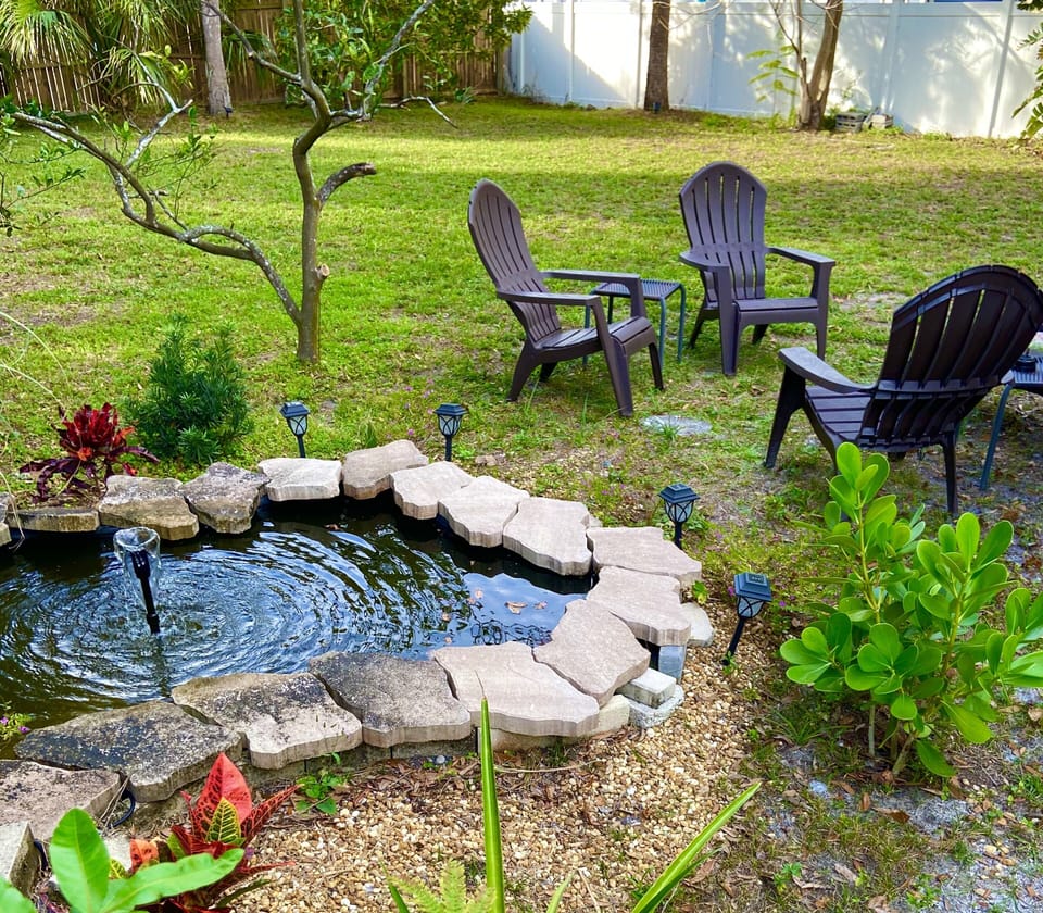 Relax and enjoy the expanaice backyard, meditation pond, hammocks, BBQ grill.