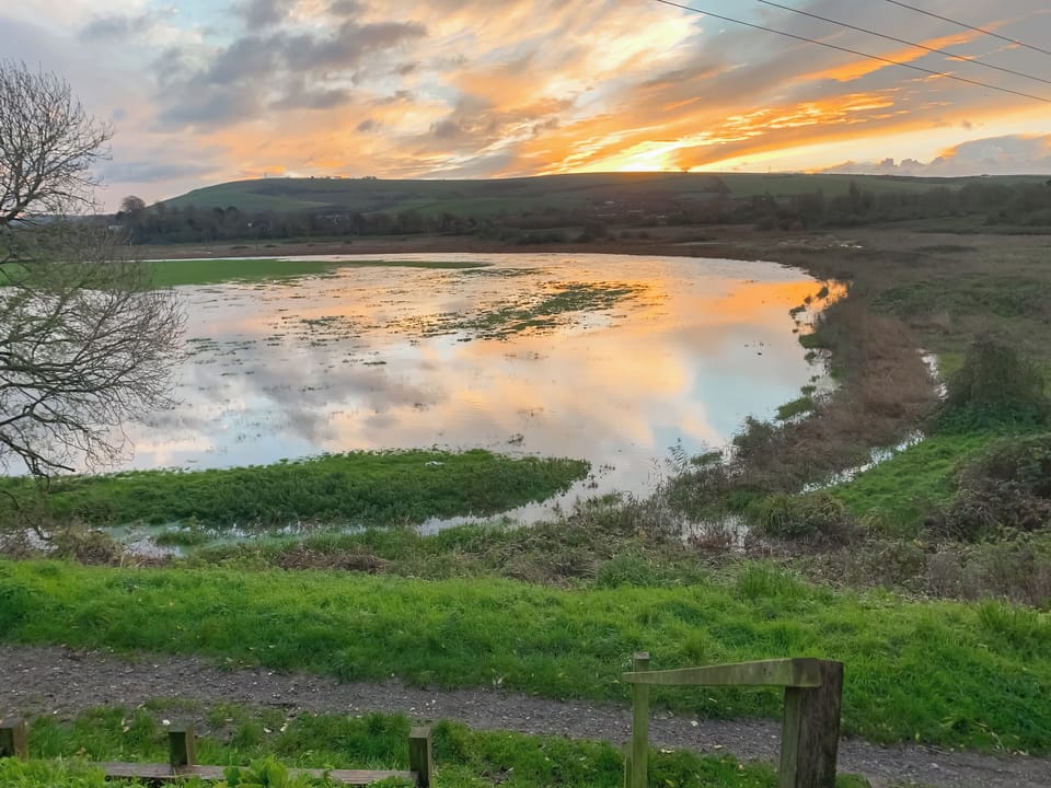Sun rise over the flooded field | Lodge With A View, Steyning