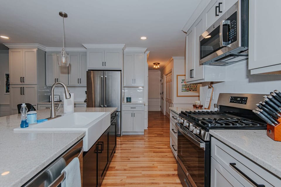 Kitchen equipped with: microwave, pots, pans, spices, dishware, silverware, cooking utensils, stove & oven, kettle, drip coffee machine, Keurig, french press, wine glasses, toaster, and more!