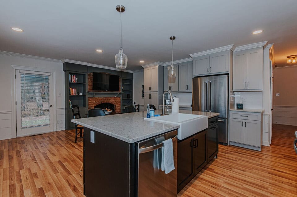 Kitchen equipped with: microwave, pots, pans, spices, dishware, silverware, cooking utensils, stove & oven, kettle, drip coffee machine, Keurig, french press, wine glasses, toaster, and more!