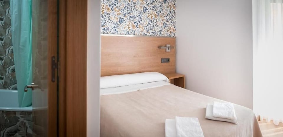 Double Room | Desk, blackout drapes, iron/ironing board (on request), WiFi (free)