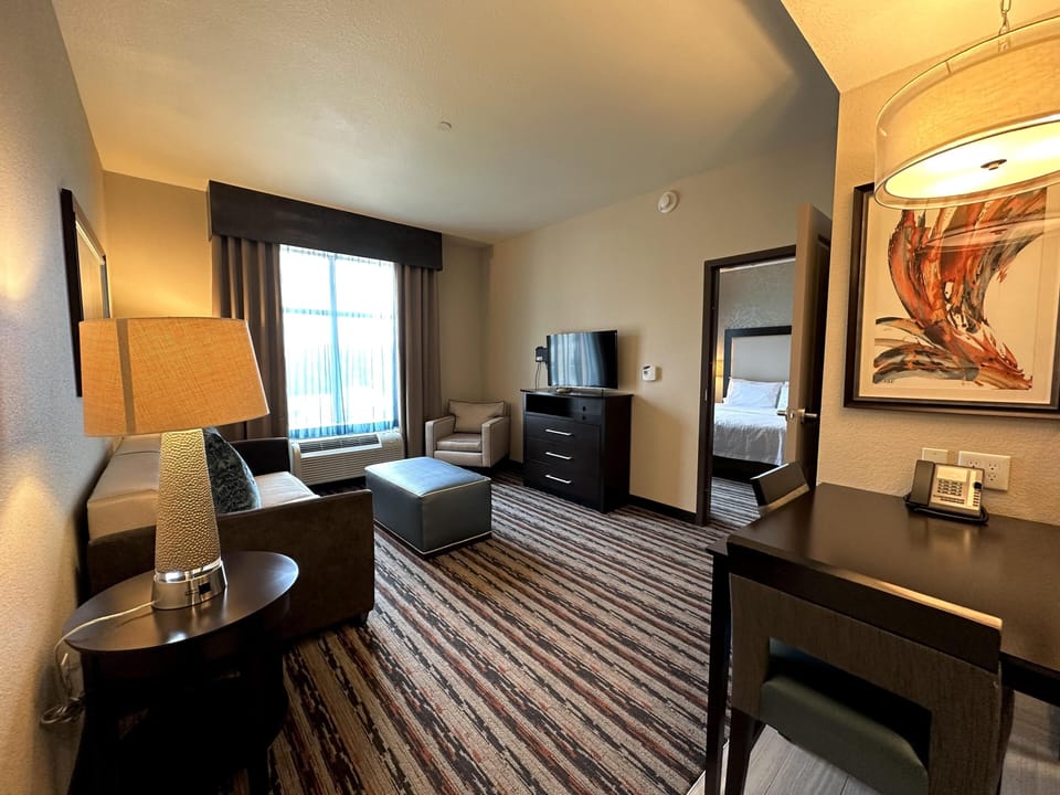 Suite, 1 King Bed, Non Smoking | 1 bedroom, hypo-allergenic bedding, in-room safe, desk