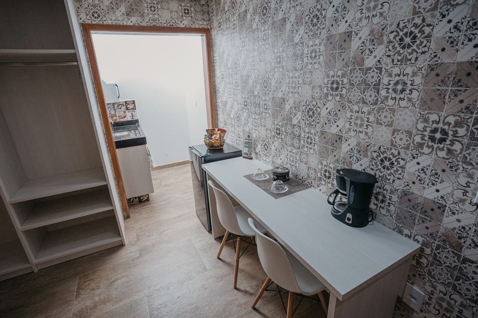 Comfort Triple Room | Private kitchen | Mini-fridge, microwave, coffee/tea maker, electric kettle