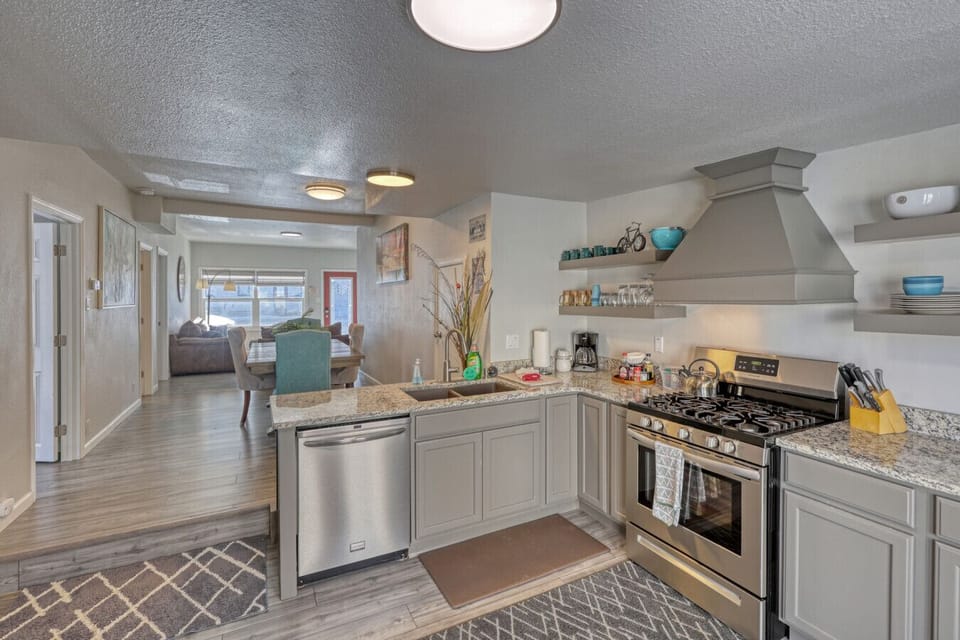 Step down kitchen W/ stainless steel appliances