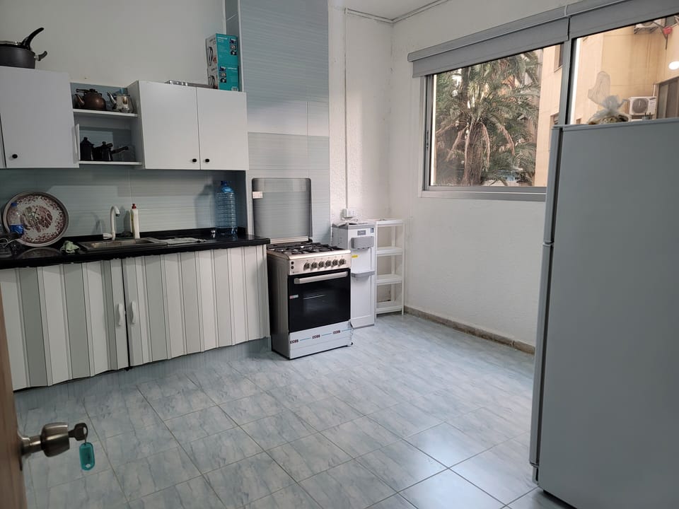 Mini-fridge, shared microwave, oven, cookware/dishes/utensils