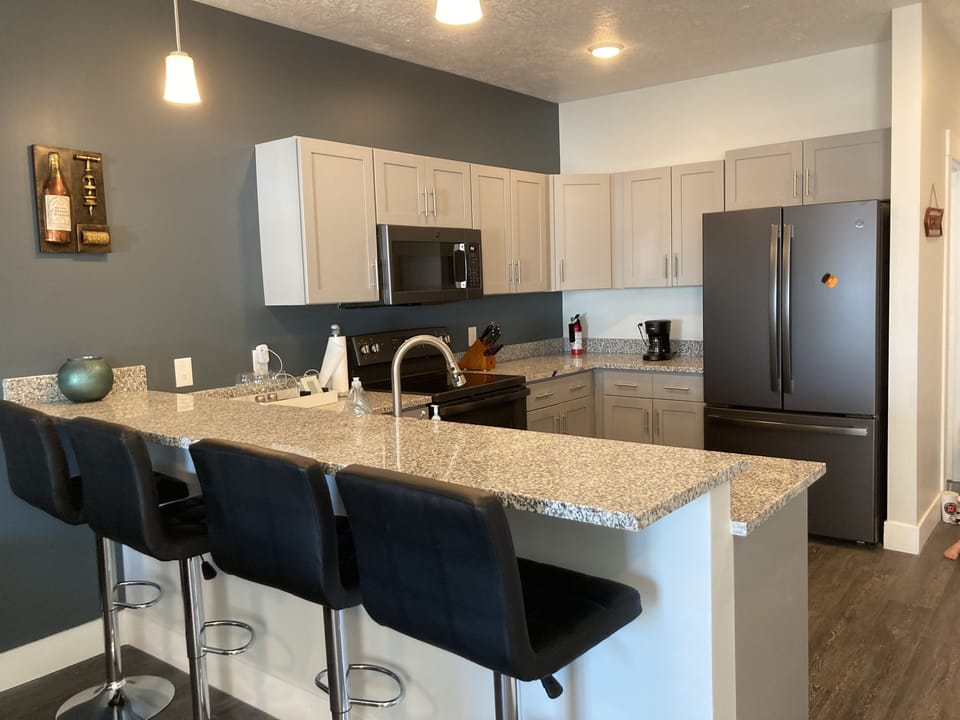 Kitchen with bar seating for 4