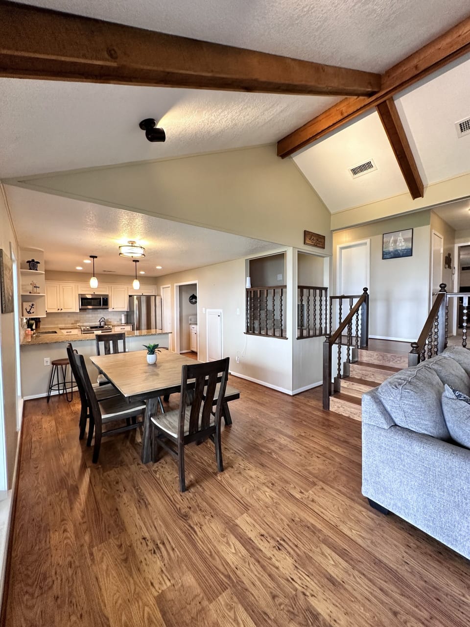 Large open floor plan connecting kitchen and dining to family room.
