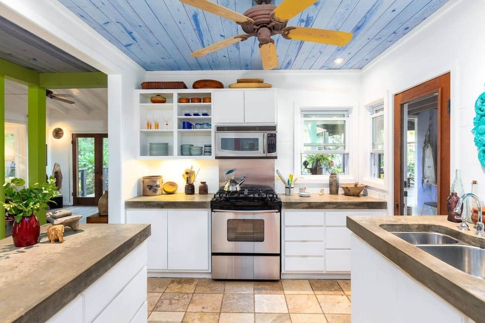Bright, fully equipped kitchen with stainless appliances