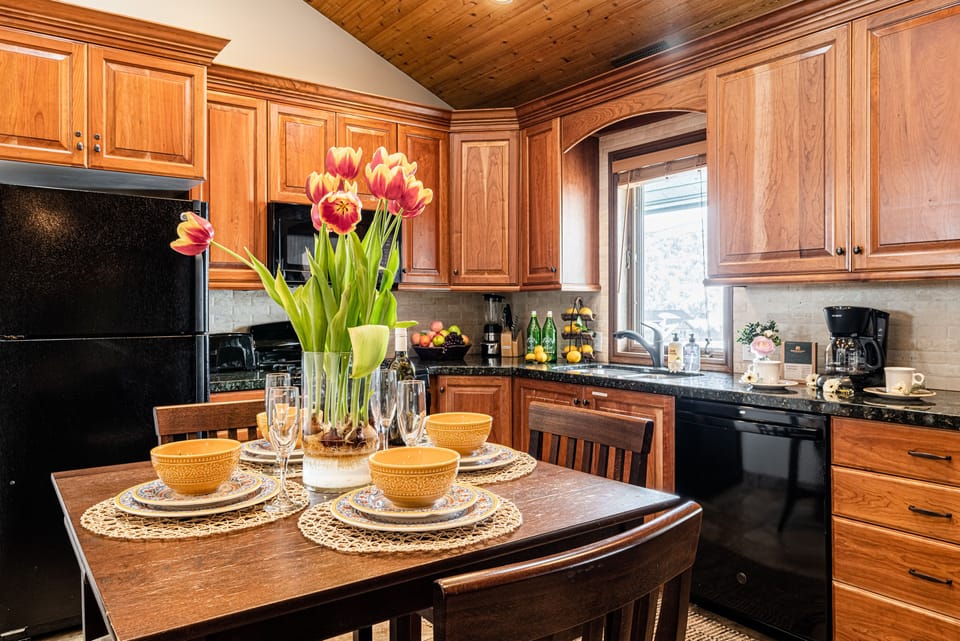 Kitchen & Dining Area with GE appliances and seating for 4