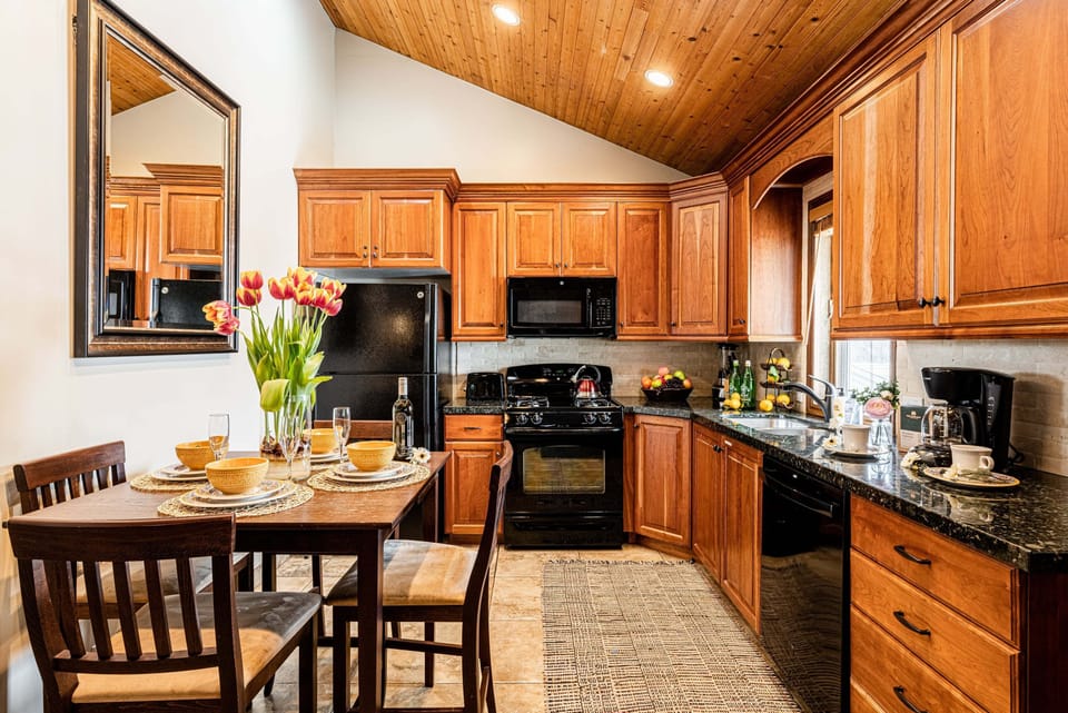 Kitchen & Dining Area with GE appliances and seating for 4