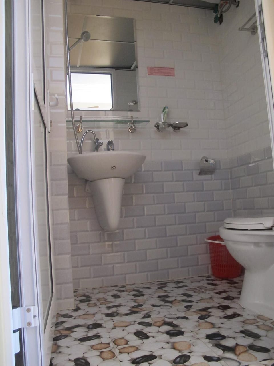 Hair dryer, slippers, bidet, towels