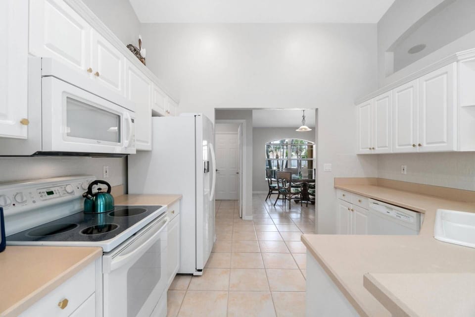 The kitchen offers sufficient storage and prep space and is fully equipped for you cooking and cocktailing endeavors.