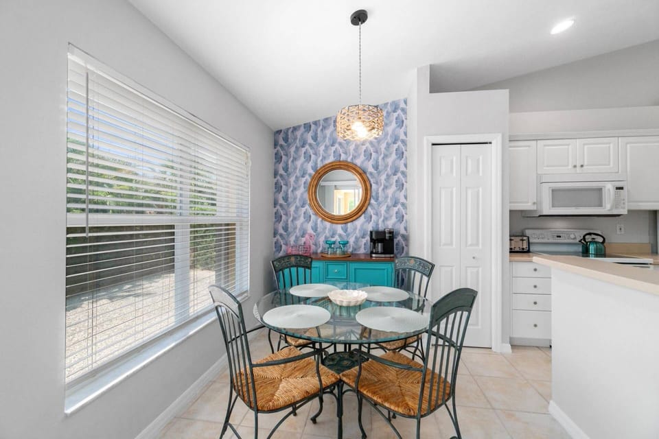 The breakfast nook includes a coffee bar (with combined Keurig and drip coffee maker) and all the cocktail-making and outdoor dining accoutrements.