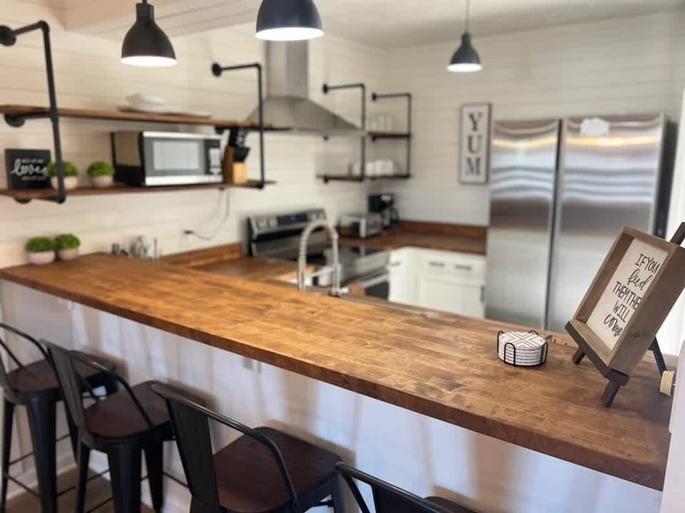 Kitchen: Bright and inviting with modern appliances and rustic charm—perfect for your culinary adventures!