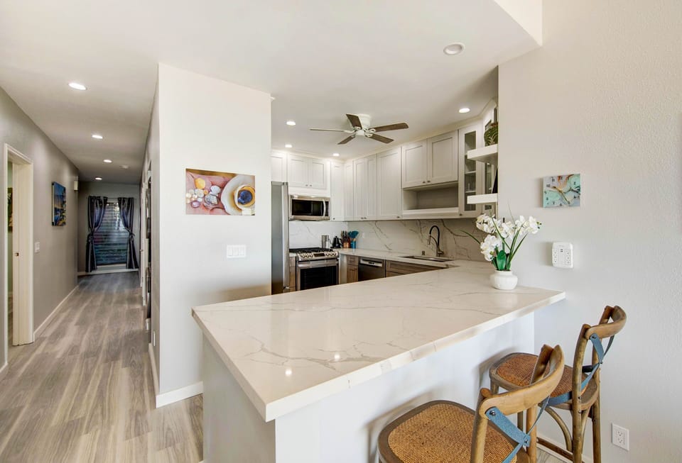 Condo, 2 Bedrooms | Private kitchen | Coffee/tea maker, fridge, oven, dishwasher