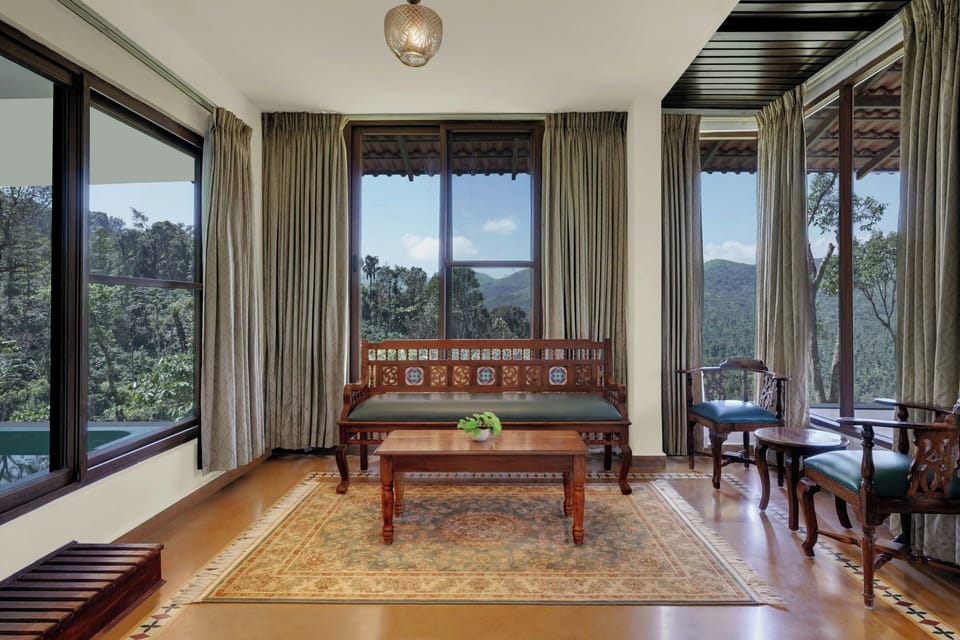 Suite, 2 Bedrooms | Living room | 32-inch LCD TV with satellite channels, TV