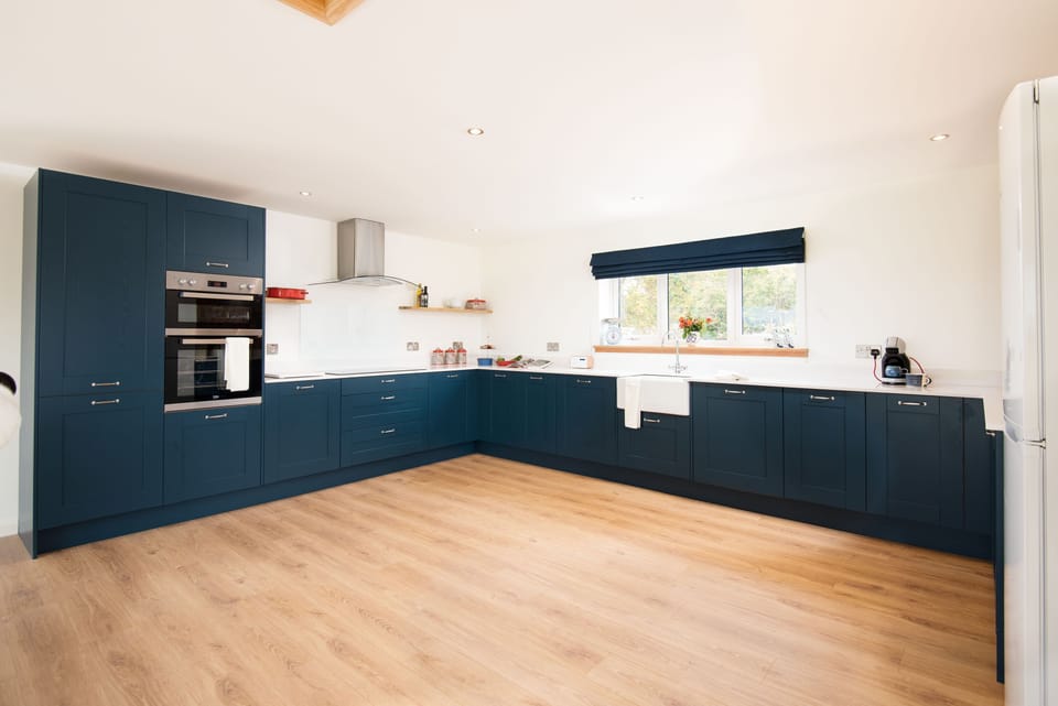 Westwood Cottage - newly fitted Shaker-style kitchen with large six-ring induction hob and Belfast sink