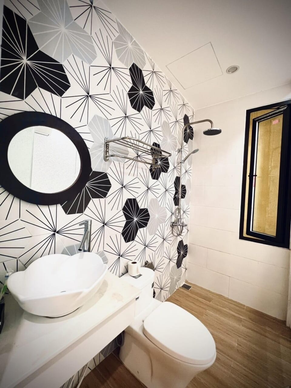 Shower, hydromassage showerhead, eco-friendly toiletries, hair dryer