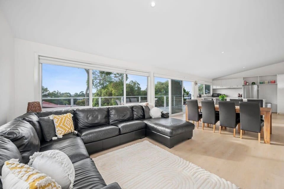 The cosy lounge is perfect for unwinding after a day at the beach or exploring the local area