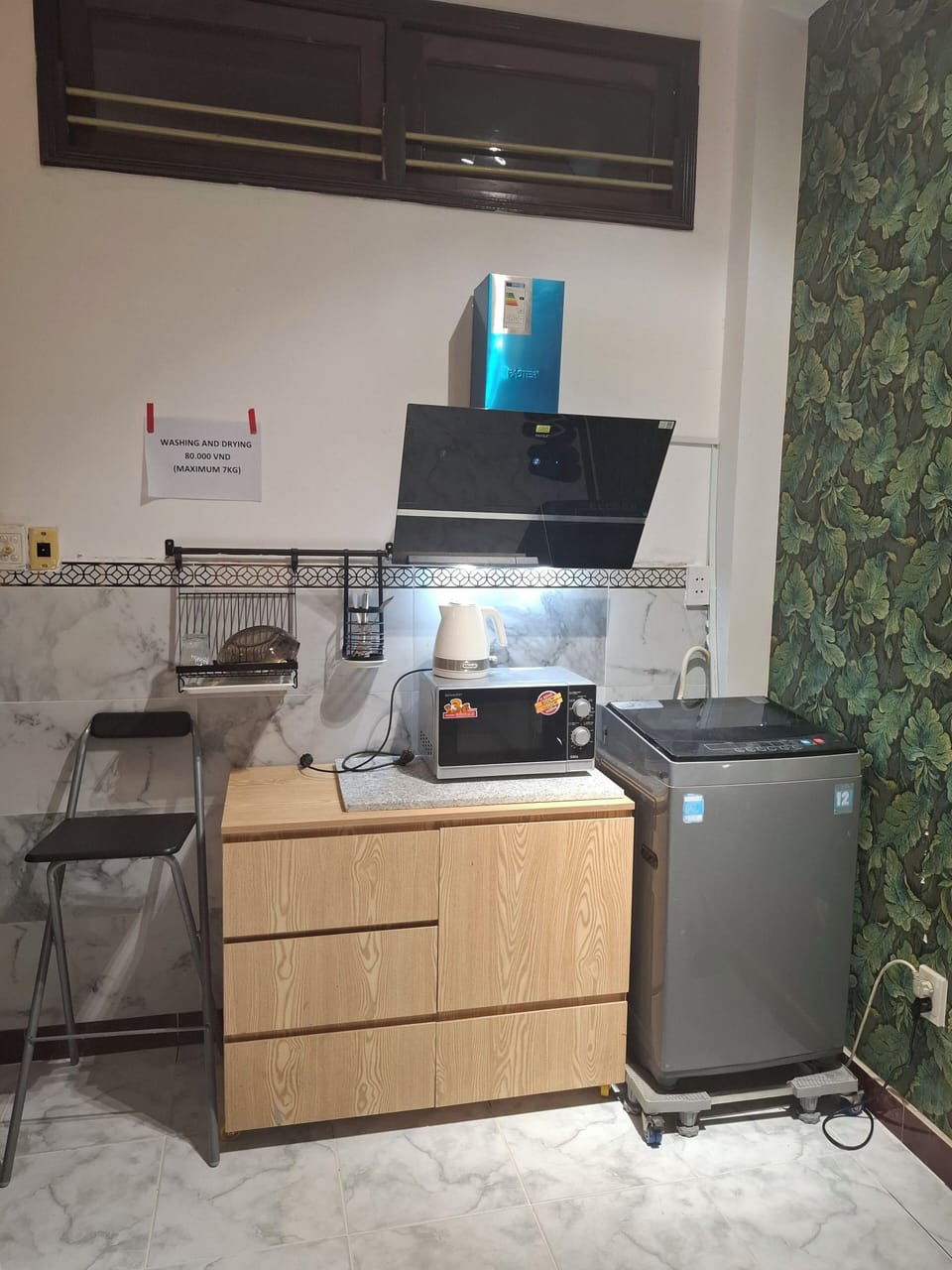 Mini-fridge, microwave, electric kettle, cleaning supplies