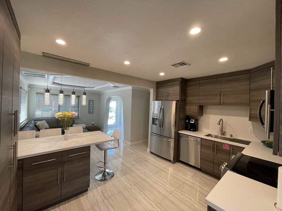 Full Kitchen/Island/ living room and front entrance 