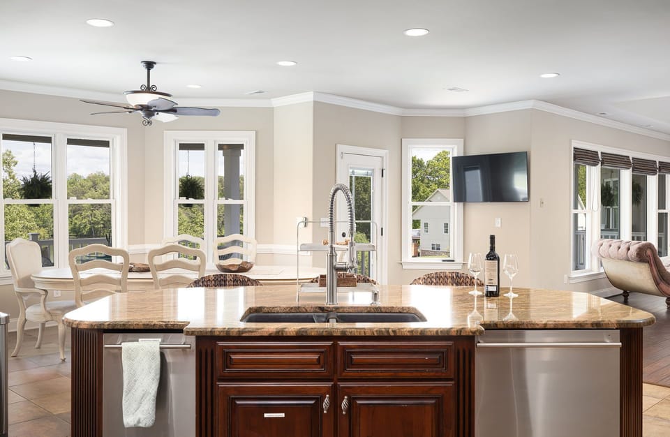 Kitchen Island with a Rotating Television that can Face the Kitchen or the Living Room