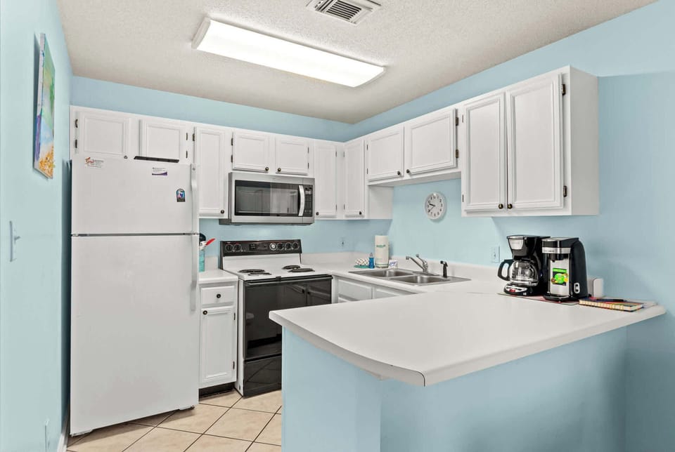 We offer a full kitchen stocked with a fridge, dishwasher, range, microwave, dishes, cutlery, pots & pans, crock pot, blender, toaster, griddle, and more!