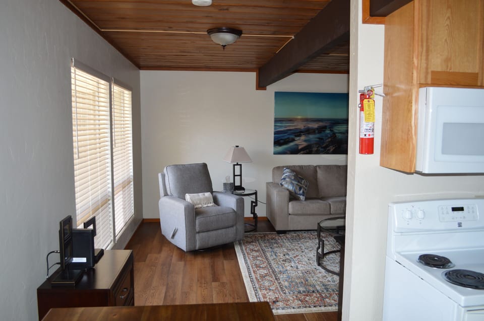 Partial view of the living room and kitchen from dining room