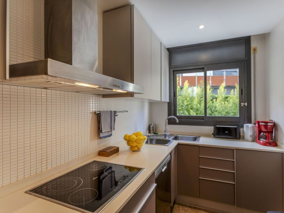 Kitchen, Kitchen Appliance, Countertop, Cabinetry, Kitchen Sink, Major Appliance, Interior Design, Kitchen Stove, Home Appliance, Sink