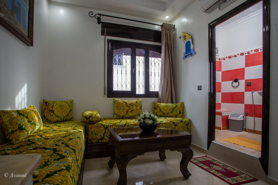 32-inch flat-screen TV with satellite channels, books