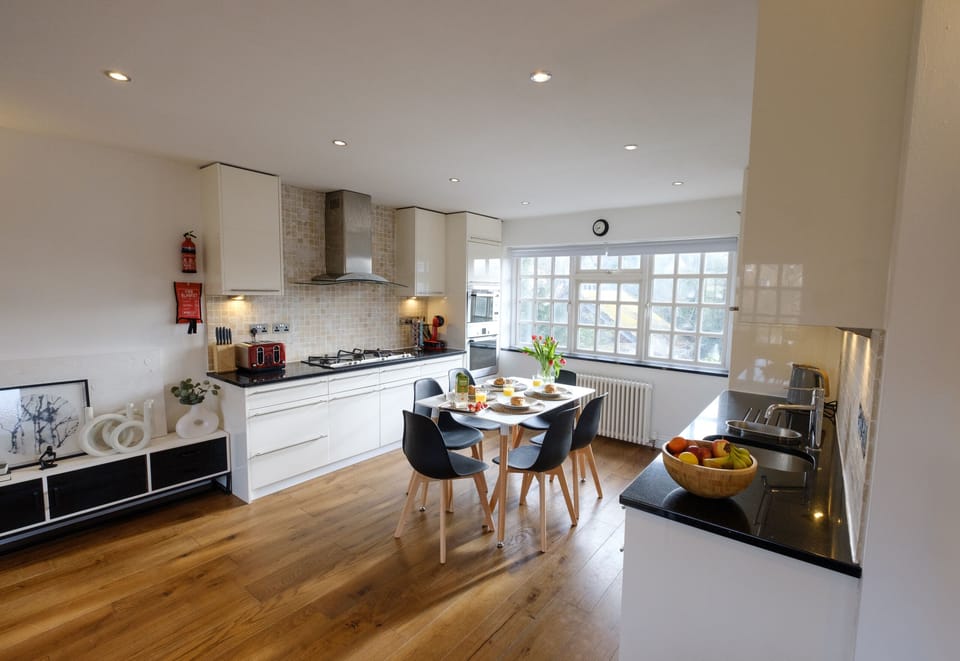 Luxury Apartment, Private Bathroom, Garden View (Riverwalk Apartment North) | Shared kitchen | Highchair