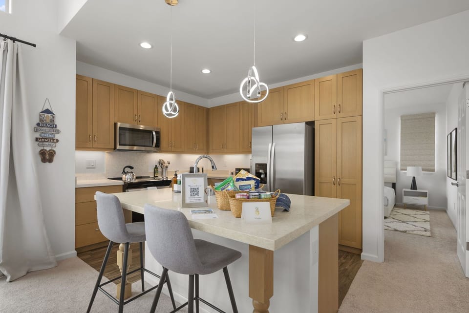 Barstool seating at the kitchen island.