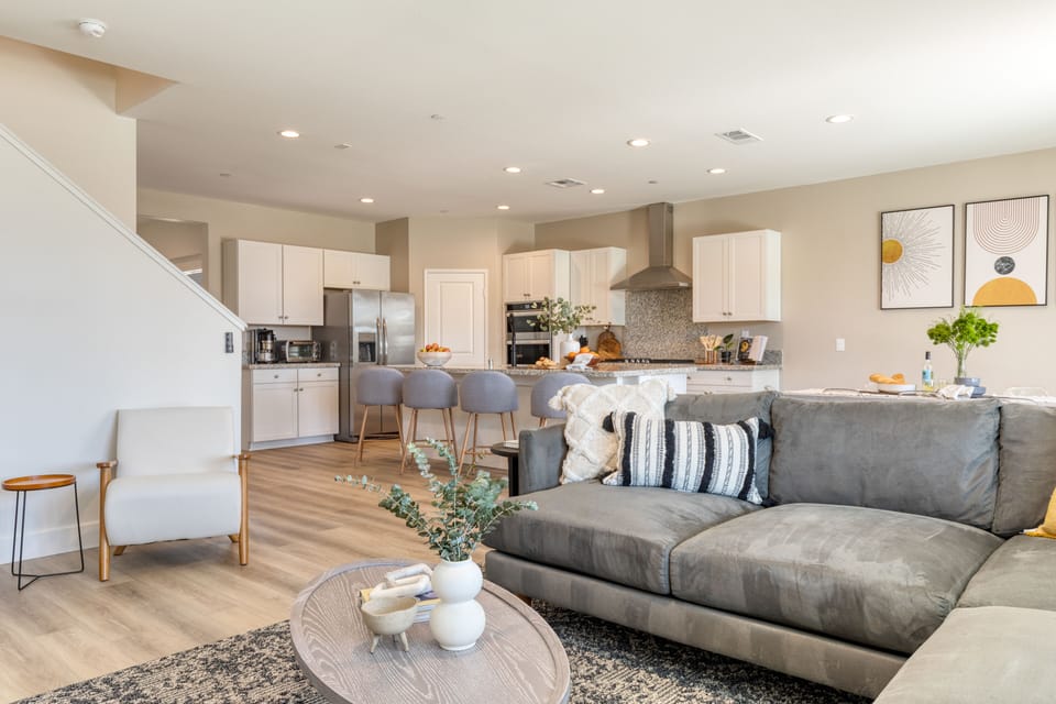 Open layout makes it easy to connect throughout the living, dining, and kitchen areas.