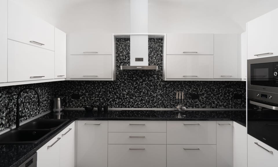 Black Occhio Villa | Private kitchen | Espresso maker, coffee/tea maker, electric kettle