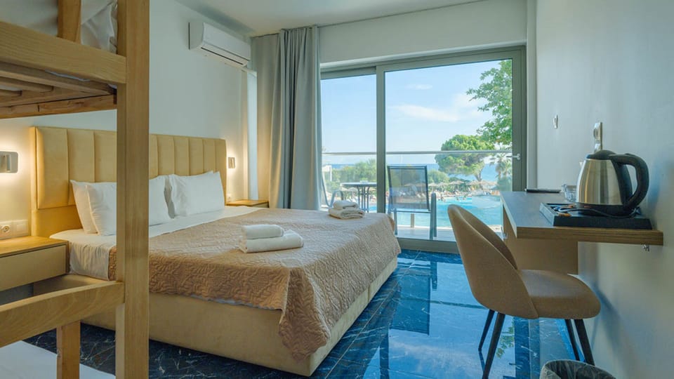 Standard Family Room - Bunk Bed Sea View | In-room safe, laptop workspace, soundproofing, bed sheets