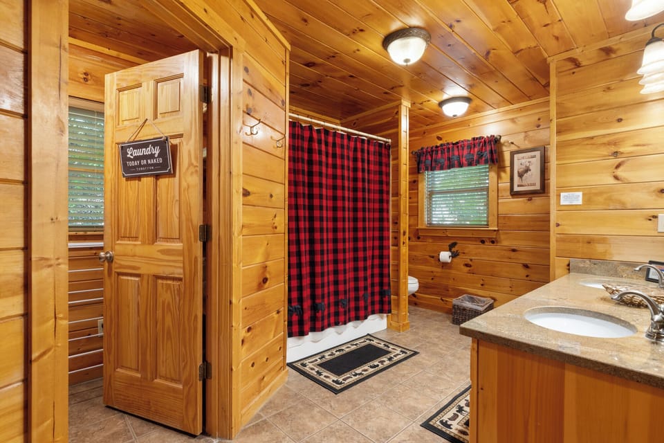 Main floor bathroom with a shower tub combo